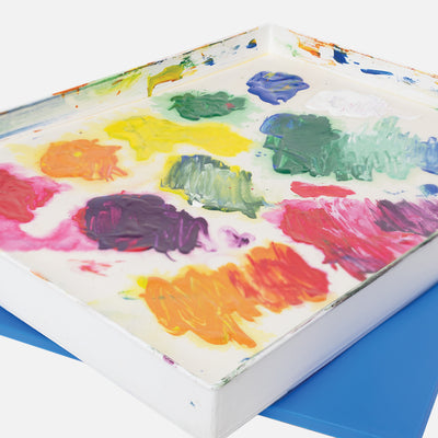 Masterson Palette Seal with artist mixing paint in paint palette