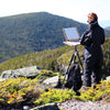 u.go Plein Air Anywhere Pochade Box, 11" x 14.5" model, setup on tripod while atop a mountain while plain air landscape painting