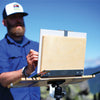 u.go Plein Air Anywhere Pochade Box, 8.4" x 11.25" model, while plein air landscape painting atop a mountain