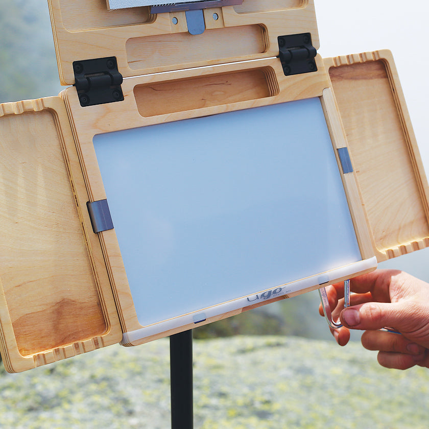 u.go Plein Air Cinch strapped around u.go Anywhere Pochade Box